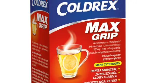 Opakowanie leku Coldrex Max Grip z naparstkiem cytrynowym i parującym napojem.